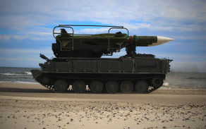 Odpalovací zařízení s ostrými raketami zajíždí do palebného postavení. 